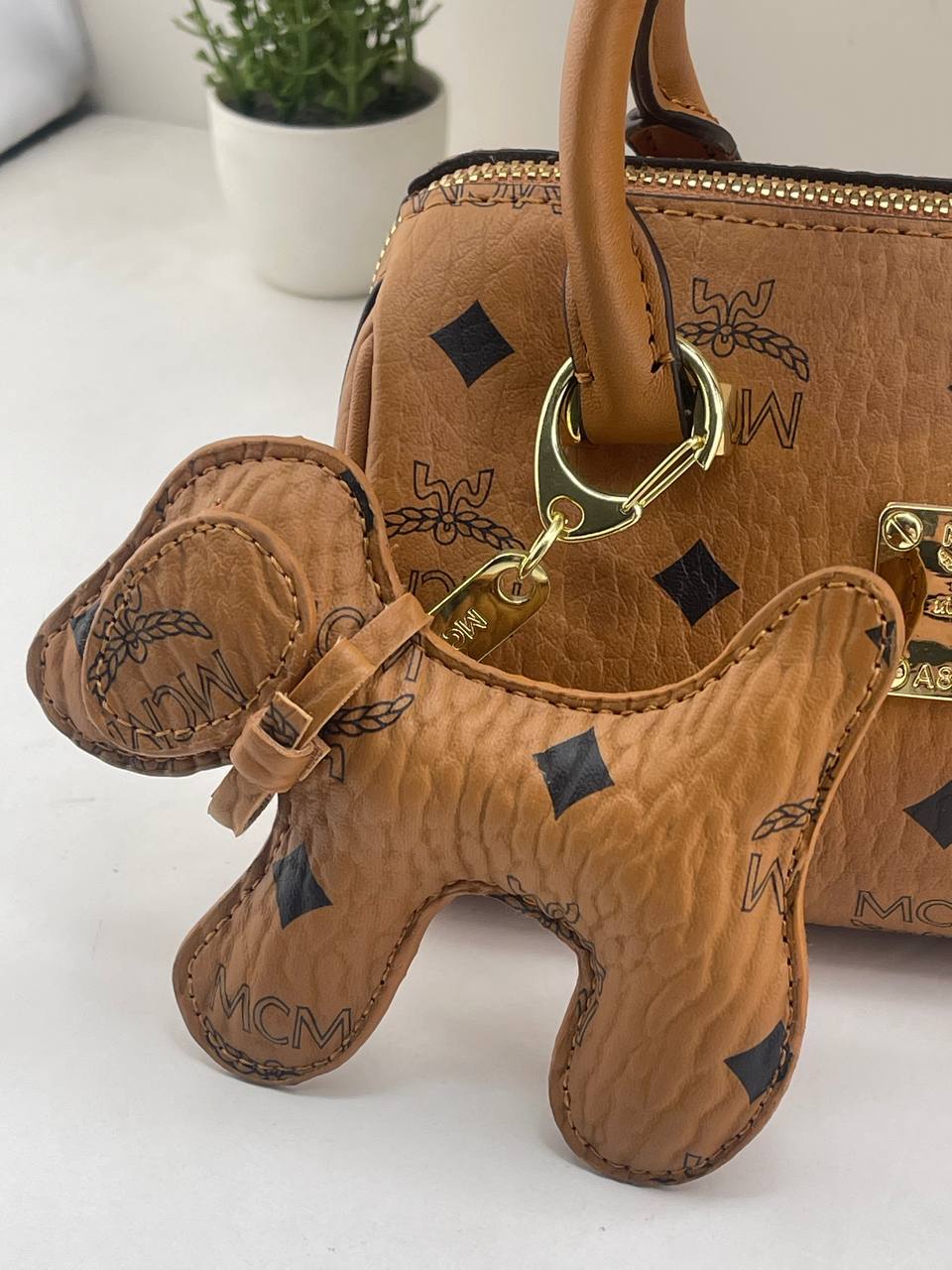 MCM Heritage Cognac Boston Bag with Puppy Charm Set