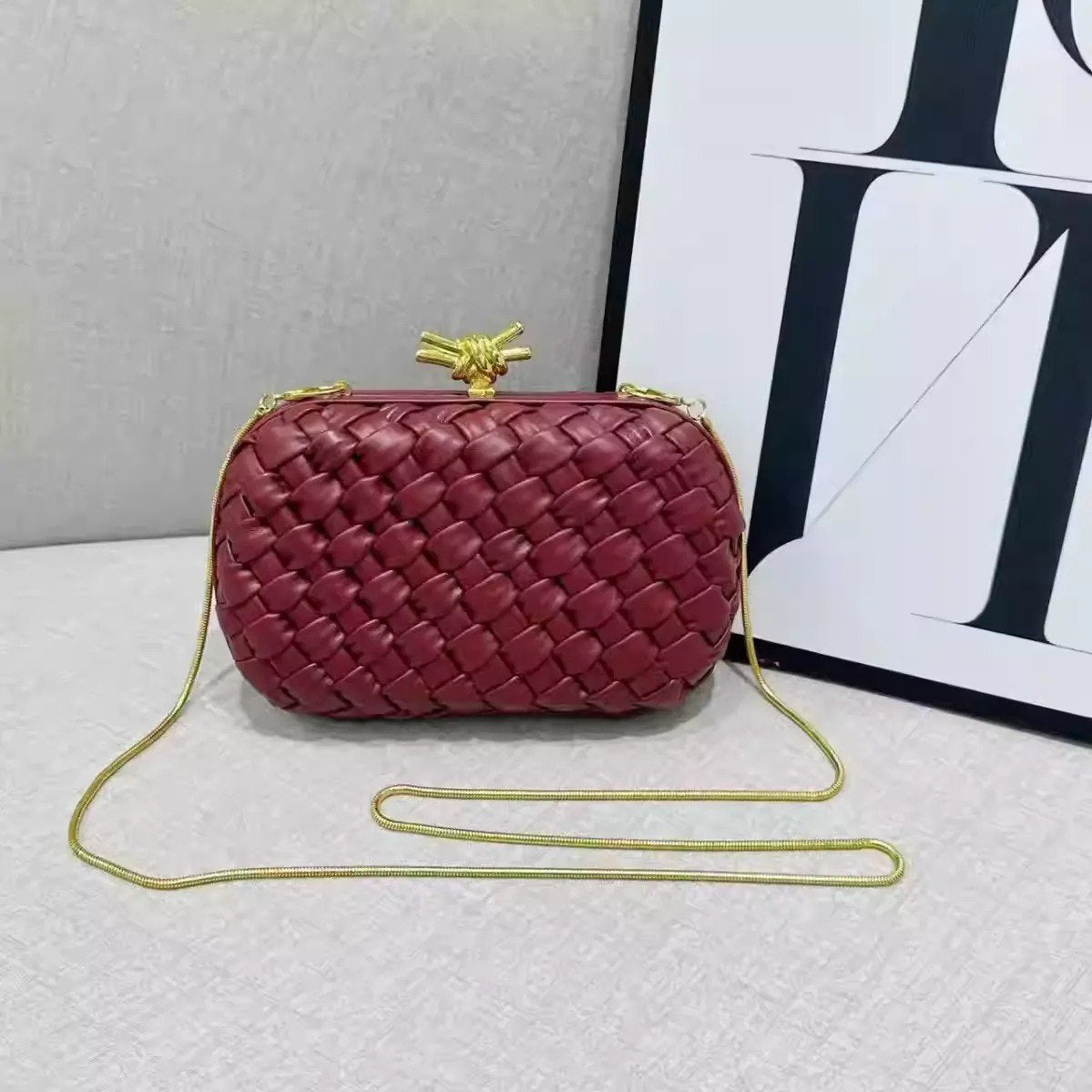 Bottega Veneta Intrecciato Knot Clutch Bag