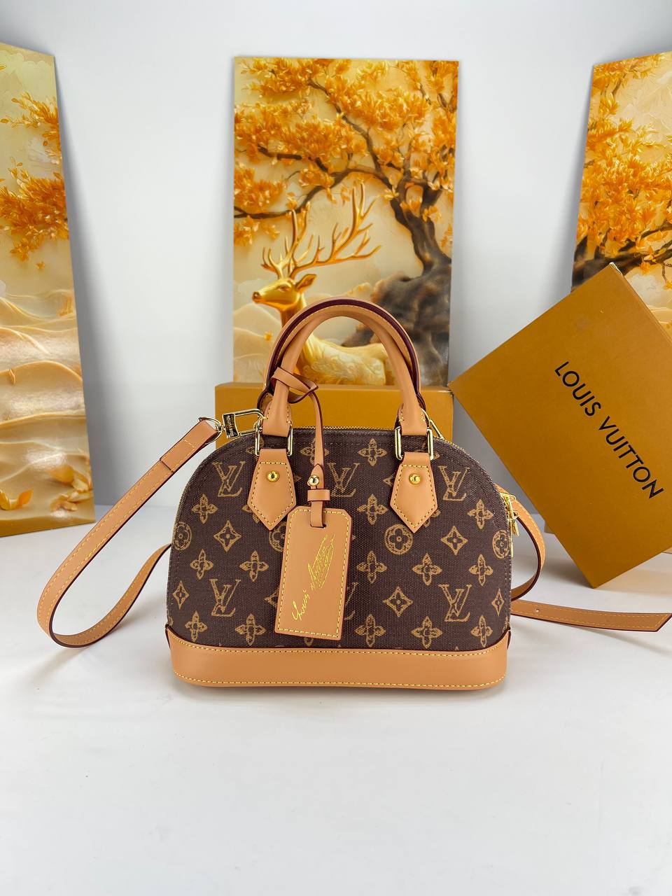 Louis Vuitton Alma BB Monogram Handbag