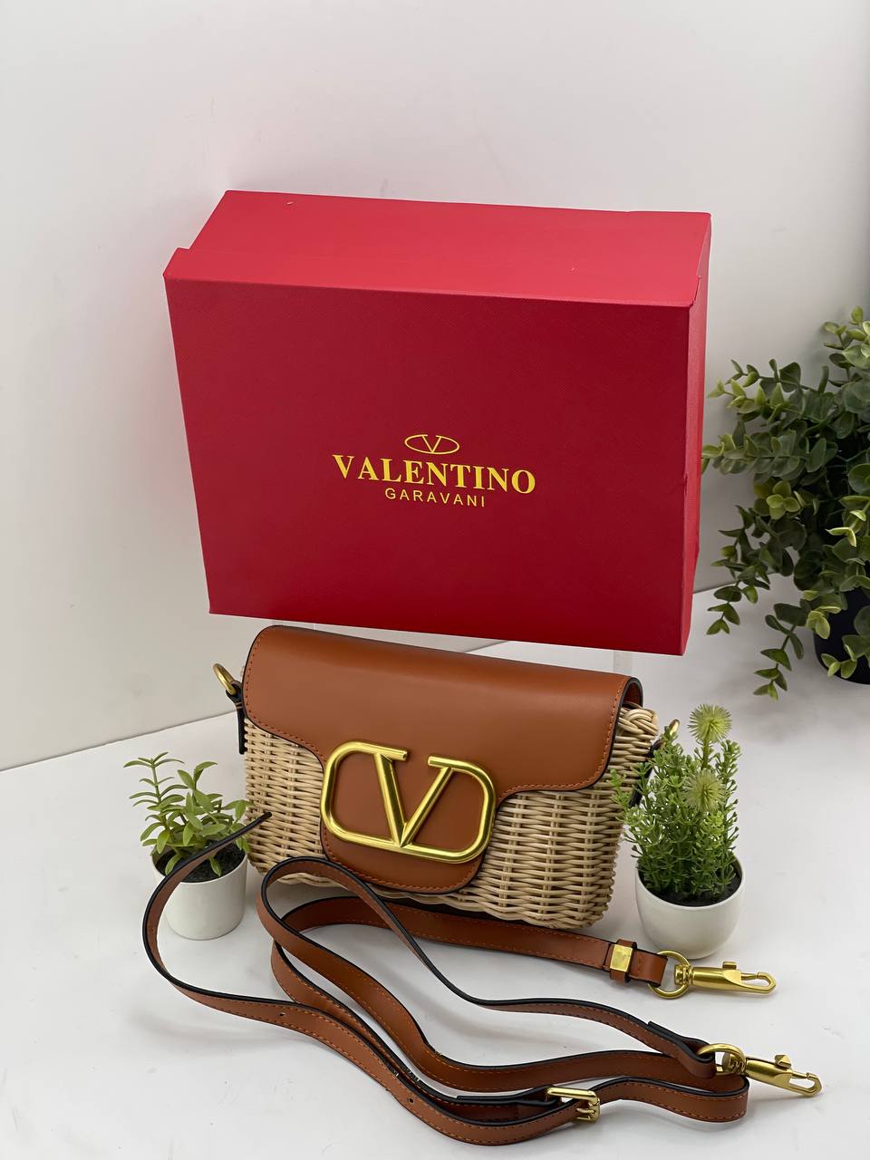 The Valentino Garavani VLogo Woven Shoulder Bag