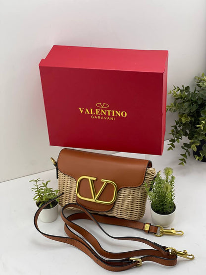The Valentino Garavani VLogo Woven Shoulder Bag