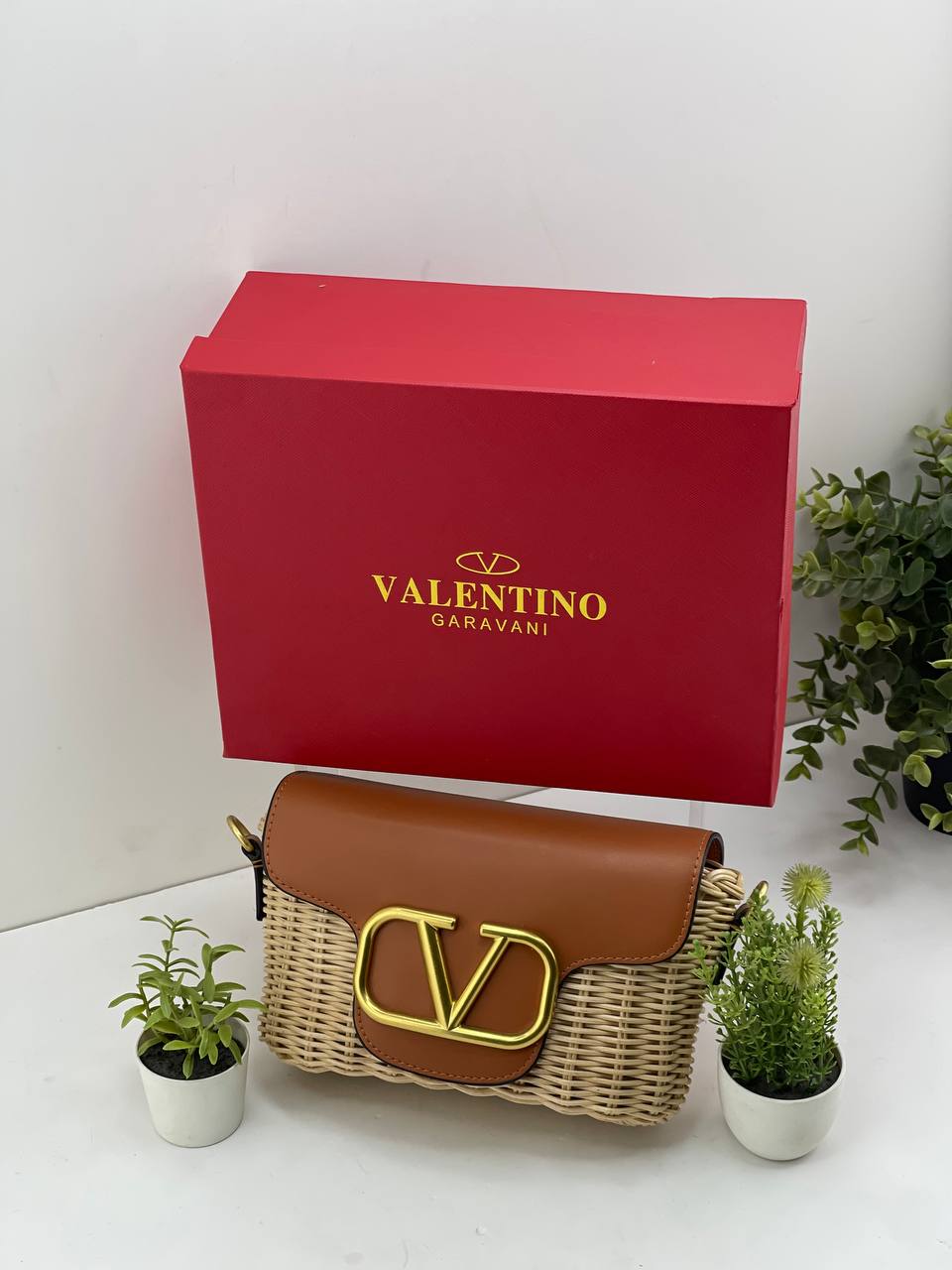 The Valentino Garavani VLogo Woven Shoulder Bag