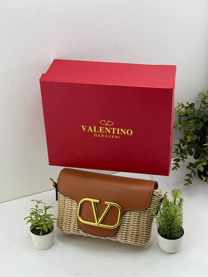The Valentino Garavani VLogo Woven Shoulder Bag