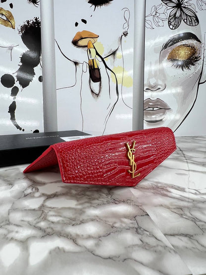YSL 🎁Title: Bold & Beautiful: The Red YSL Croc Clutch