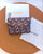GUESS Tri-Fold Compact Wallet with 3D Monogram Pattern