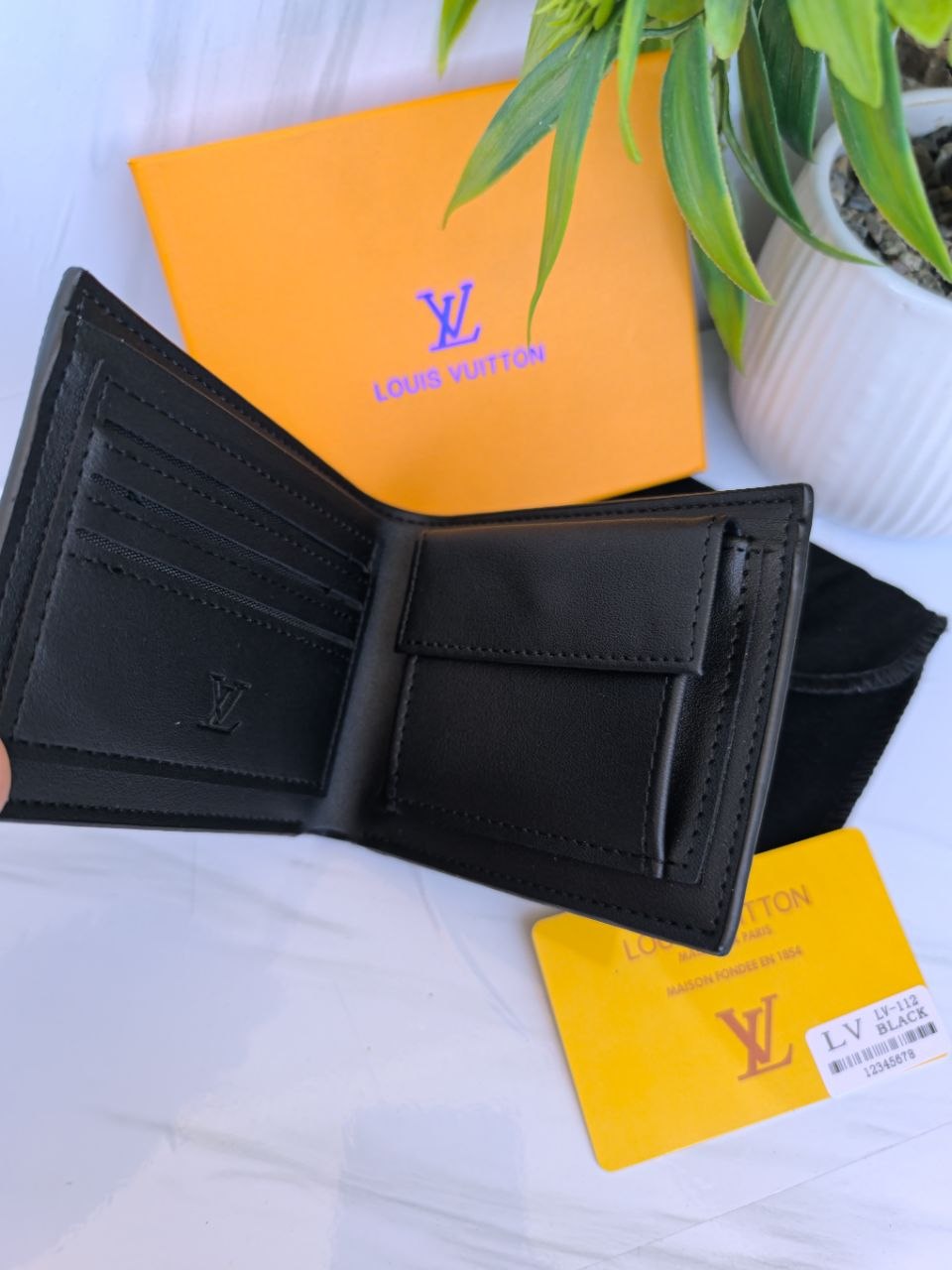 Louis Vuitton Monogram Bi-Fold Wallet